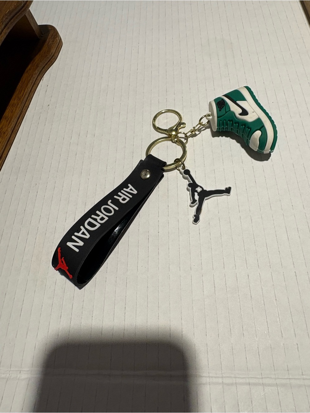 Jordan Men’s Black Keychain with Green Sneaker Charm